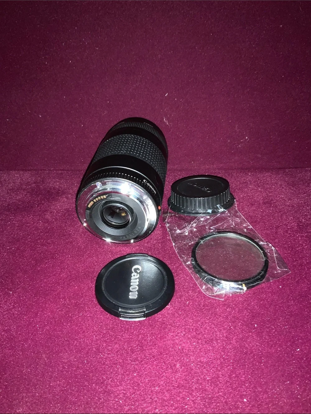Canon Black 75-300mm f/1.4-5.6 ll Telephoto Zoom Lens with covers. Good cond.